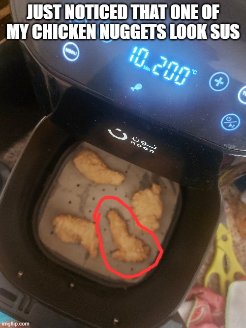 I was cooking chicken and then I noticed that one of my chickens looks weird | JUST NOTICED THAT ONE OF MY CHICKEN NUGGETS LOOK SUS | image tagged in chicken | made w/ Imgflip meme maker