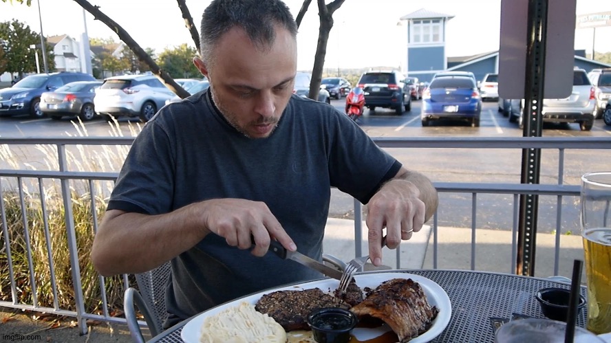 Man eating steak | image tagged in man eating steak | made w/ Imgflip meme maker