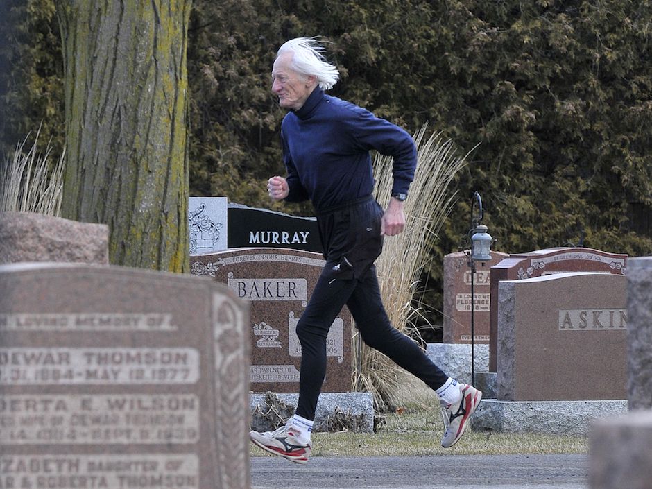 Old guy jogging in cemetery Blank Meme Template