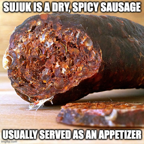 Sujuk | SUJUK IS A DRY, SPICY SAUSAGE; USUALLY SERVED AS AN APPETIZER | image tagged in sausage,food,memes | made w/ Imgflip meme maker