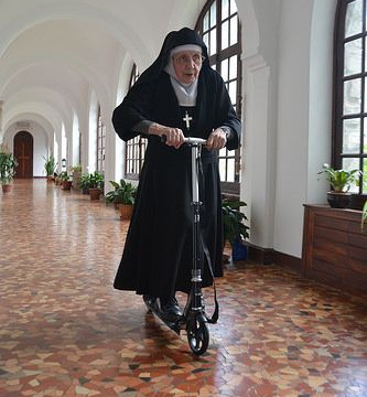 nun on a scooter Blank Meme Template