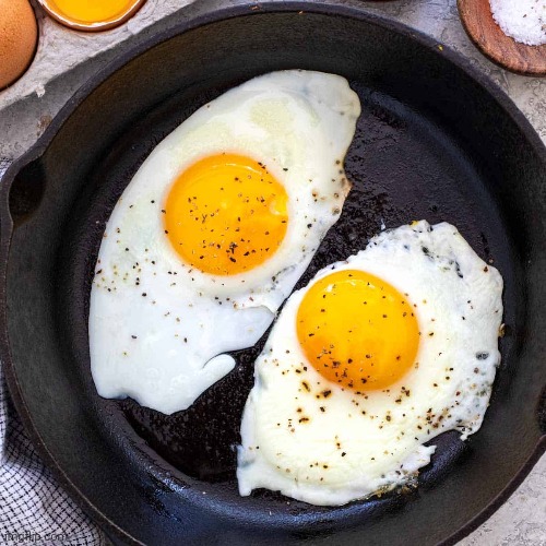 eggs | image tagged in eggs,egg,seasoned,in a pan,fried foods | made w/ Imgflip meme maker