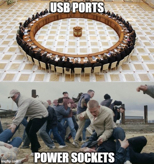 No universal power sockets? | USB PORTS; POWER SOCKETS | image tagged in men discussing men fighting,power sockets,universal,usb | made w/ Imgflip meme maker
