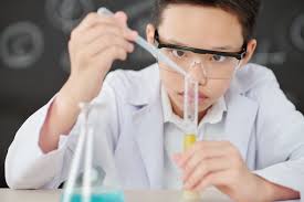 Young male science nerd doing science with test tube Blank Meme Template