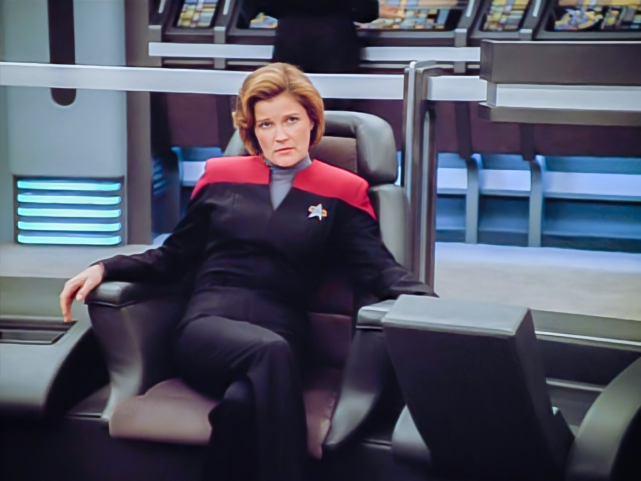 Janeway in captain's chair Blank Meme Template