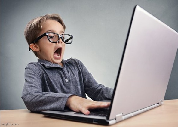 Shocked kid on computer | image tagged in shocked kid on computer | made w/ Imgflip meme maker