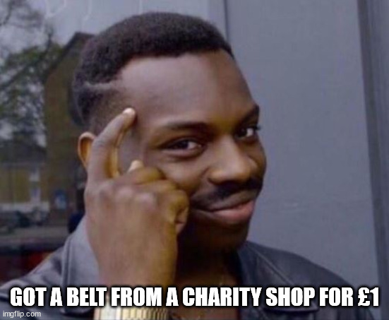black guy pointing at head | GOT A BELT FROM A CHARITY SHOP FOR £1 | image tagged in black guy pointing at head | made w/ Imgflip meme maker