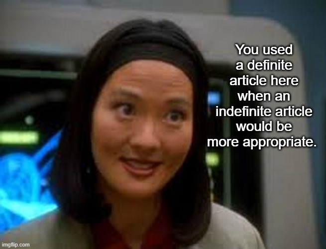 Keiko O'Brien Smiling | You used a definite article here when an indefinite article would be more appropriate. | image tagged in keiko o'brien smiling | made w/ Imgflip meme maker