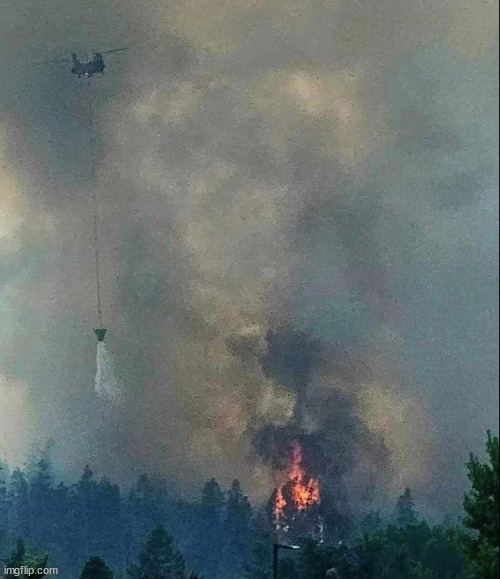 Wildfires out here and we are in the middle. Helicopter dropping water. | image tagged in wildfires,helicopter,water | made w/ Imgflip meme maker