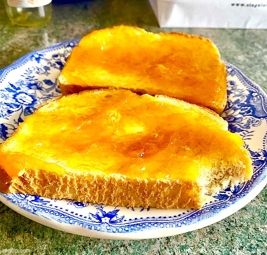It’s a toast. A cheese and Peach Jam toast | made w/ Imgflip meme maker