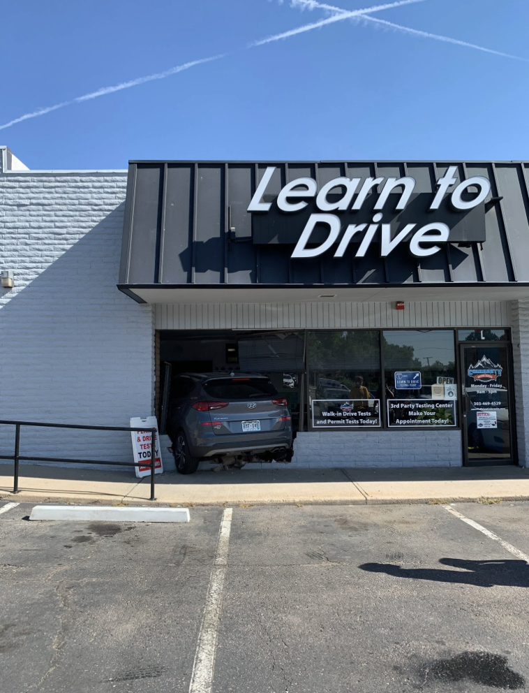 Driving instructor crashes into driving school Blank Meme Template