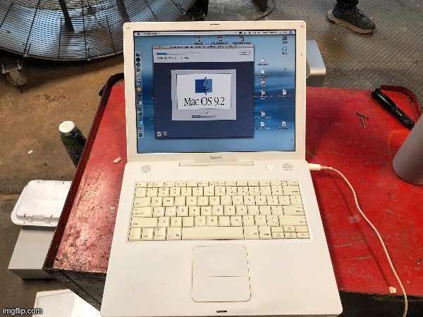 Apple iBook G4 (don’t know exactly when it was released, but the clock was dated march 24th 2001, which could mean more than 22  | image tagged in laptop,computer,apple | made w/ Imgflip meme maker