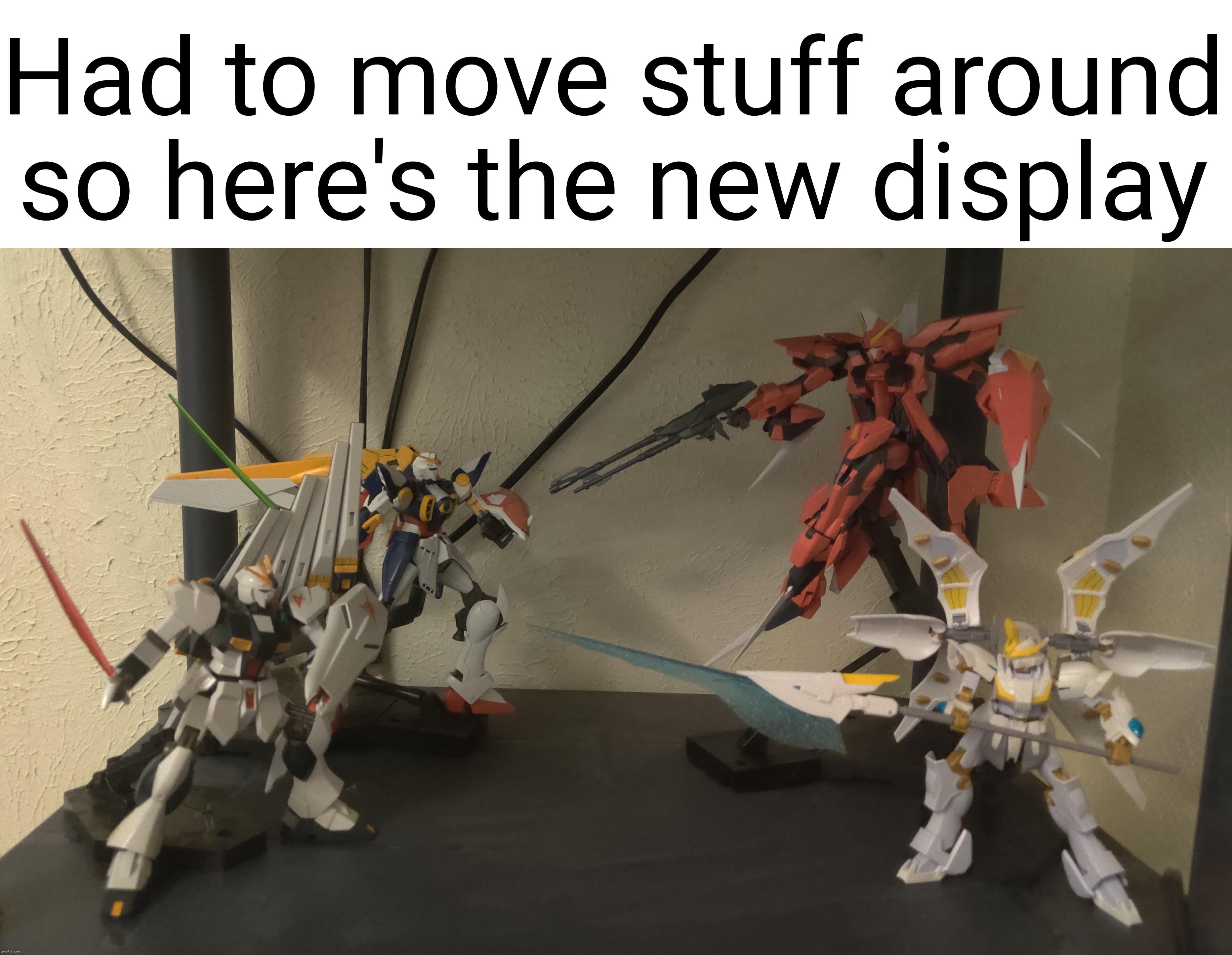 I like how it turned out even though the rx 93 kinda blocks the wing gundam, ironically because of it's wing | Had to move stuff around so here's the new display | made w/ Imgflip meme maker