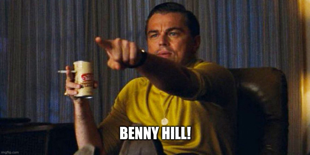 Leo pointing | BENNY HILL! | image tagged in leo pointing | made w/ Imgflip meme maker