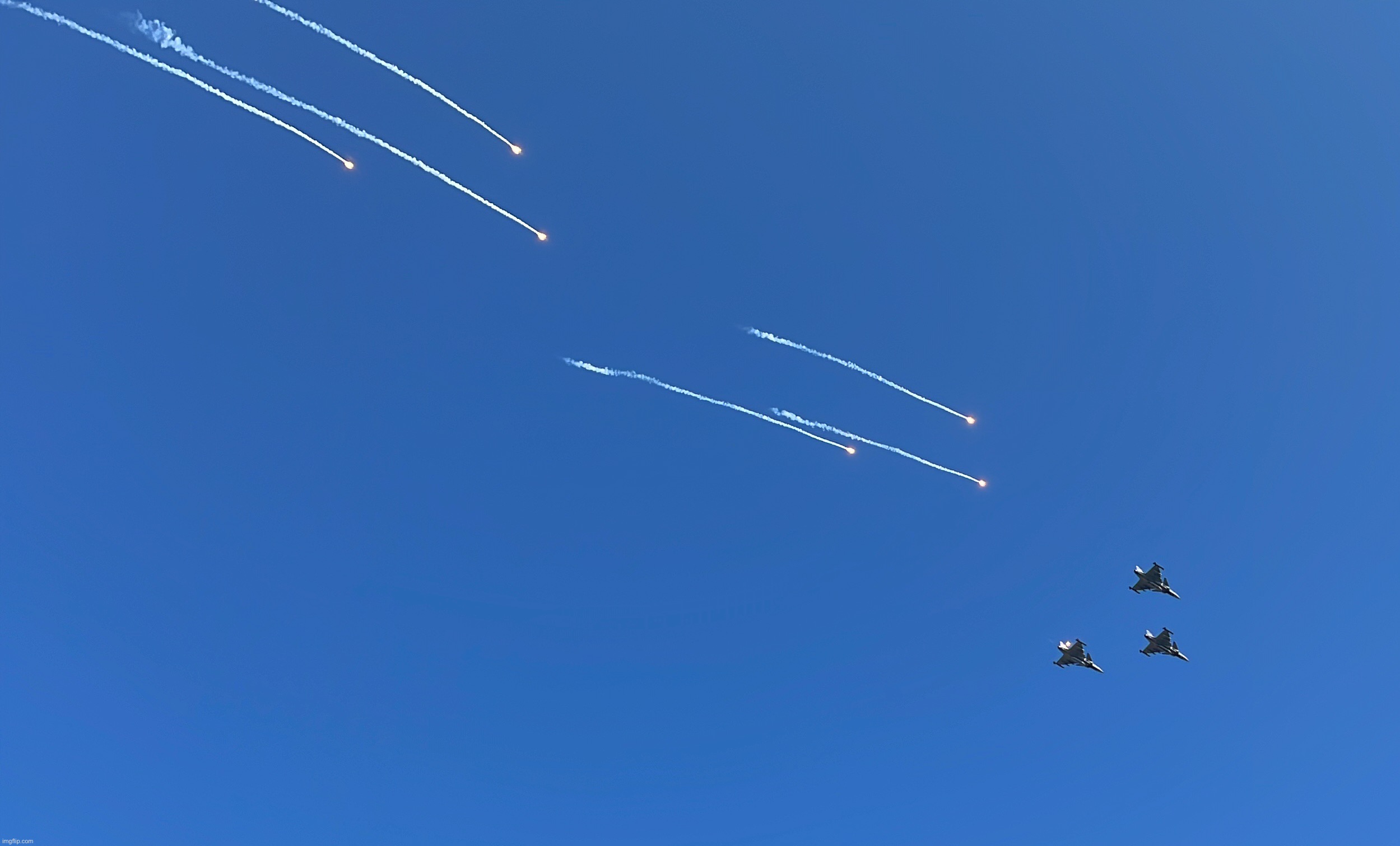 Gripen fighter jets yeeting out flares during an airshow thingy | image tagged in share your own photos,planes,fighter jet,jets | made w/ Imgflip meme maker