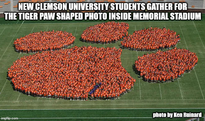 clemson paw shaped photo | NEW CLEMSON UNIVERSITY STUDENTS GATHER FOR THE TIGER PAW SHAPED PHOTO INSIDE MEMORIAL STADIUM; photo by Ken Ruinard | image tagged in clemson | made w/ Imgflip meme maker