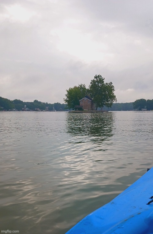 A LITTLE ISLAND ON A LAKE IN INDIANA WITH A HOUSE ON IT | image tagged in lake,island,kayak | made w/ Imgflip meme maker