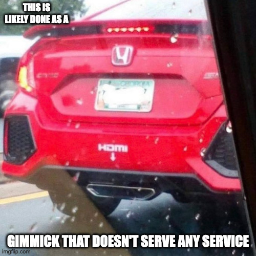 Car With HDMI Plug | THIS IS LIKELY DONE AS A; GIMMICK THAT DOESN'T SERVE ANY SERVICE | image tagged in cars,memes | made w/ Imgflip meme maker