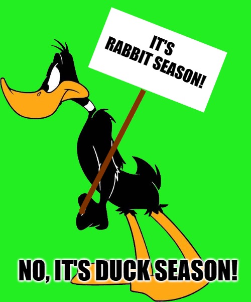 daffy with sign | IT'S RABBIT SEASON! NO, IT'S DUCK SEASON! | image tagged in daffy with sign | made w/ Imgflip meme maker