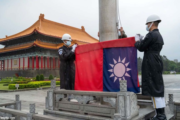Taiwan Flag Being Put Up On A Rainy Day (Cool Picture) | image tagged in fun,cool | made w/ Imgflip meme maker