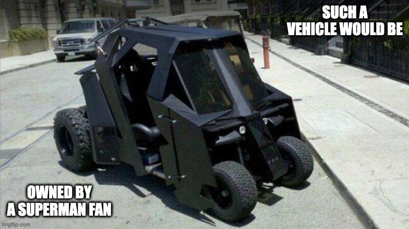 Batmobile Golf Cart | SUCH A VEHICLE WOULD BE; OWNED BY A SUPERMAN FAN | image tagged in gold cart,batman,memes | made w/ Imgflip meme maker
