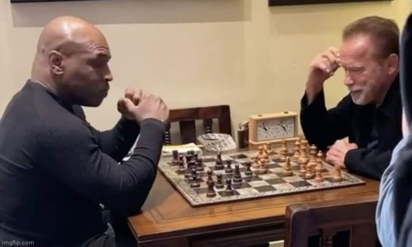 Mike Tyson and Arnold Schwarzenegger playing chess :) | image tagged in mike tyson and arnold schwarzenegger,chess | made w/ Imgflip meme maker