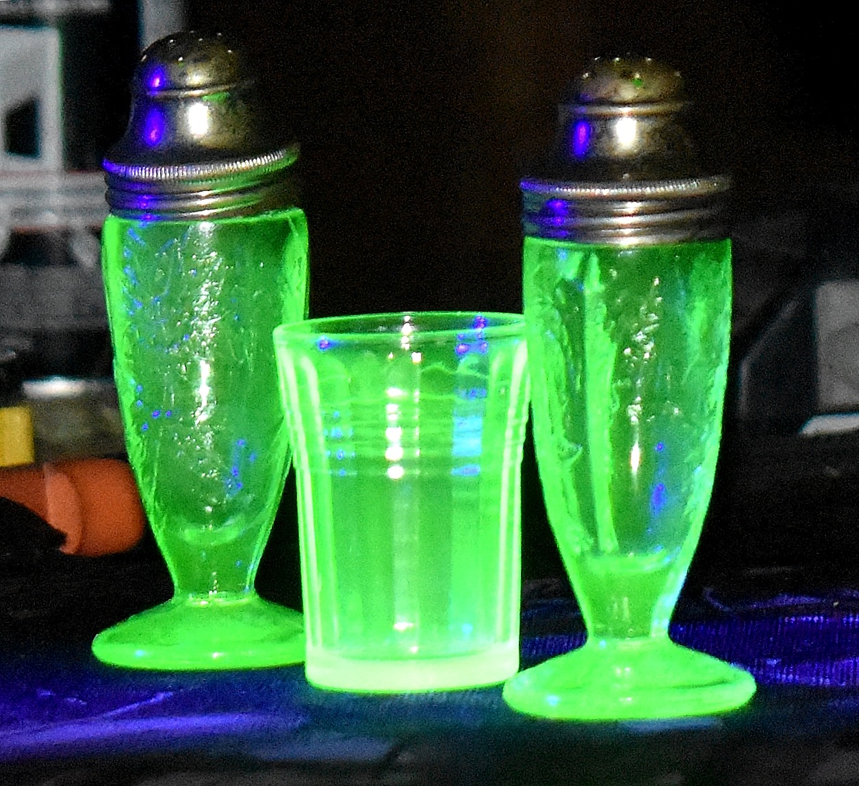Uranium glass my son found these at an estate sale. | image tagged in uranium glass,uv light | made w/ Imgflip meme maker