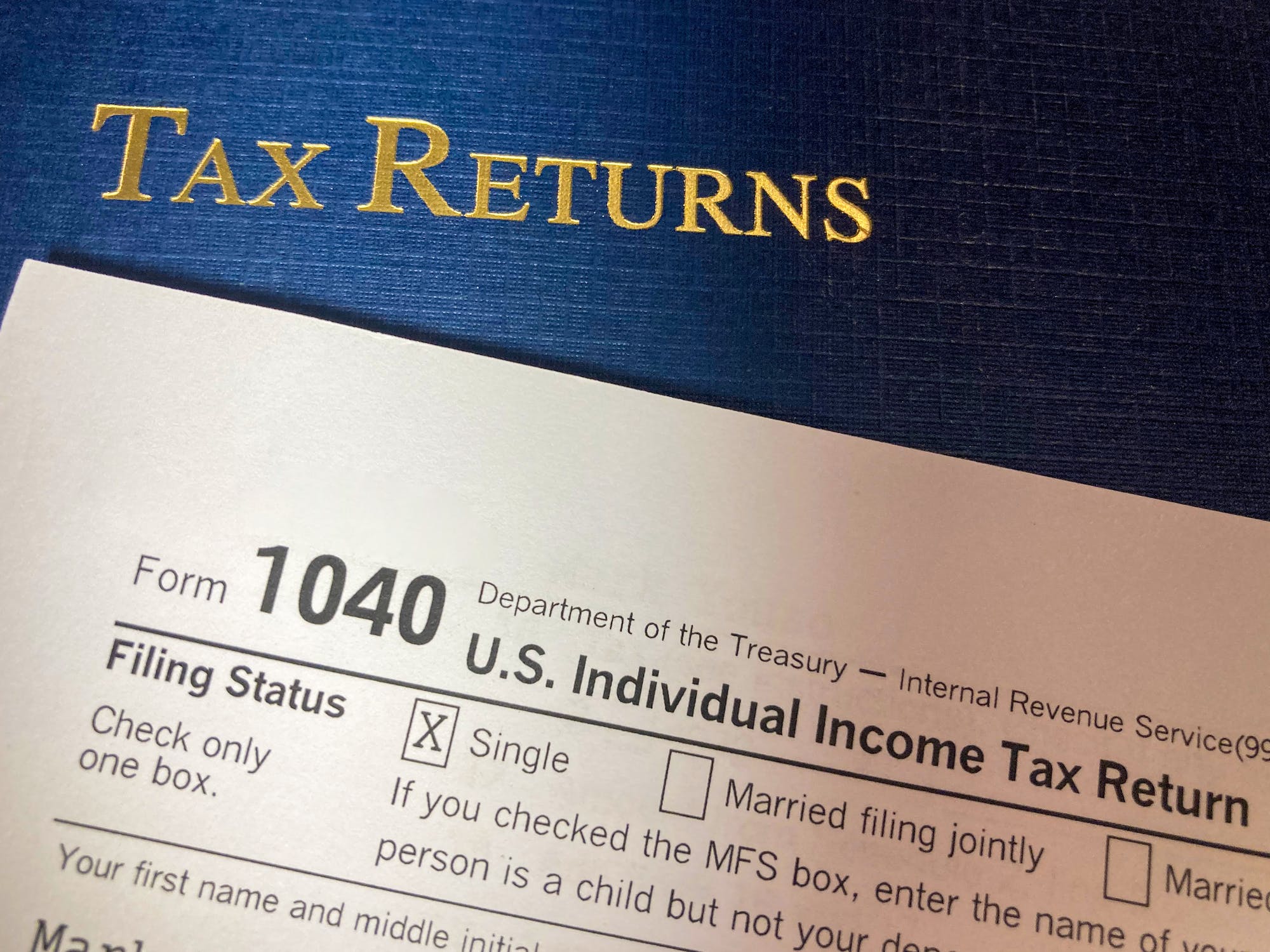 Tax Returns with Portfolio, IRS form 1040 and Cash Blank Meme Template