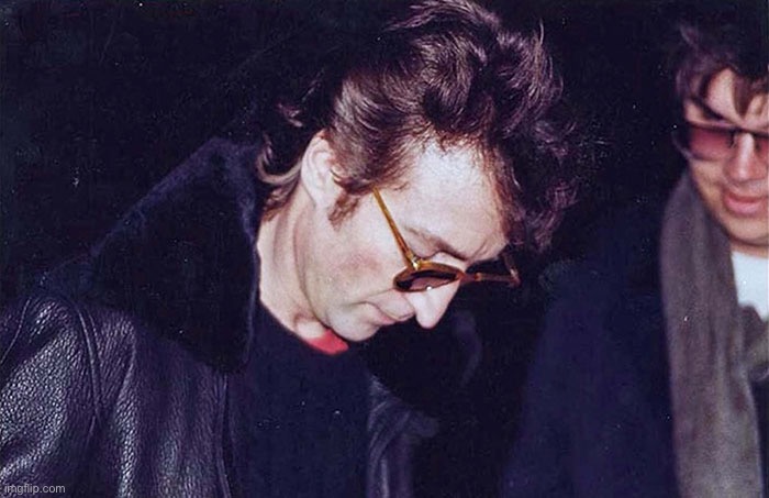 John Lennon four hours before he died giving an autograph to the man thatshot him | image tagged in john lennon,real pictures,music | made w/ Imgflip meme maker
