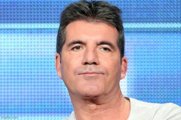Anyone else notice the lazy eye in Simon? I know he likes the dentist, but please, visit a eye specialist | image tagged in simon cowell unimpressed | made w/ Imgflip meme maker