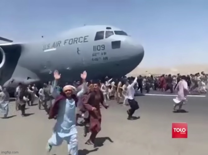 Guy running happy next to army air plane in afghanistan | image tagged in guy running happy next to army air plane in afghanistan | made w/ Imgflip meme maker