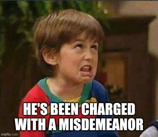 Sarcastic kid | HE'S BEEN CHARGED WITH A MISDEMEANOR | image tagged in sarcastic kid | made w/ Imgflip meme maker