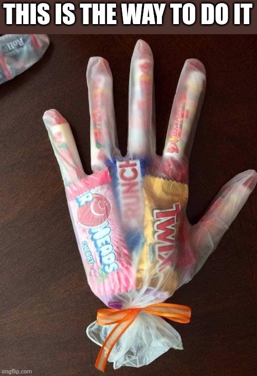 PEOPLE SHOULD 'HAND' THESE OUT | THIS IS THE WAY TO DO IT | image tagged in candy,halloween,spooky,trick or treat | made w/ Imgflip meme maker