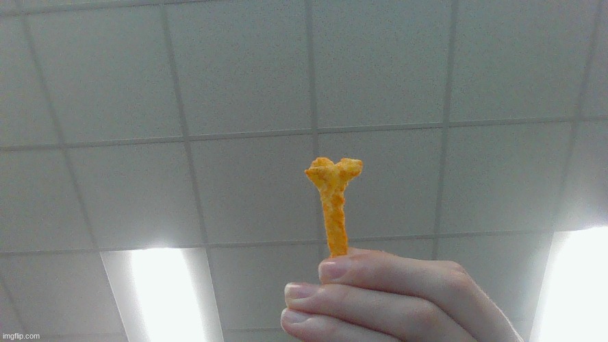 This Cheeto.... Is Unusual... | image tagged in cheetos | made w/ Imgflip meme maker