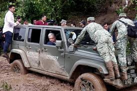 High Quality El mierdas de palacio amlo en Jeep inundación en Acapulco Blank Meme Template