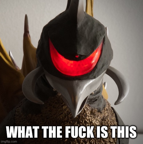 gigan staring | WHAT THE FUCK IS THIS | image tagged in gigan staring | made w/ Imgflip meme maker