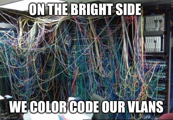 Color coded vlans | ON THE BRIGHT SIDE; WE COLOR CODE OUR VLANS | image tagged in old server rack,patch,cable,nightmare,hell,vlan | made w/ Imgflip meme maker