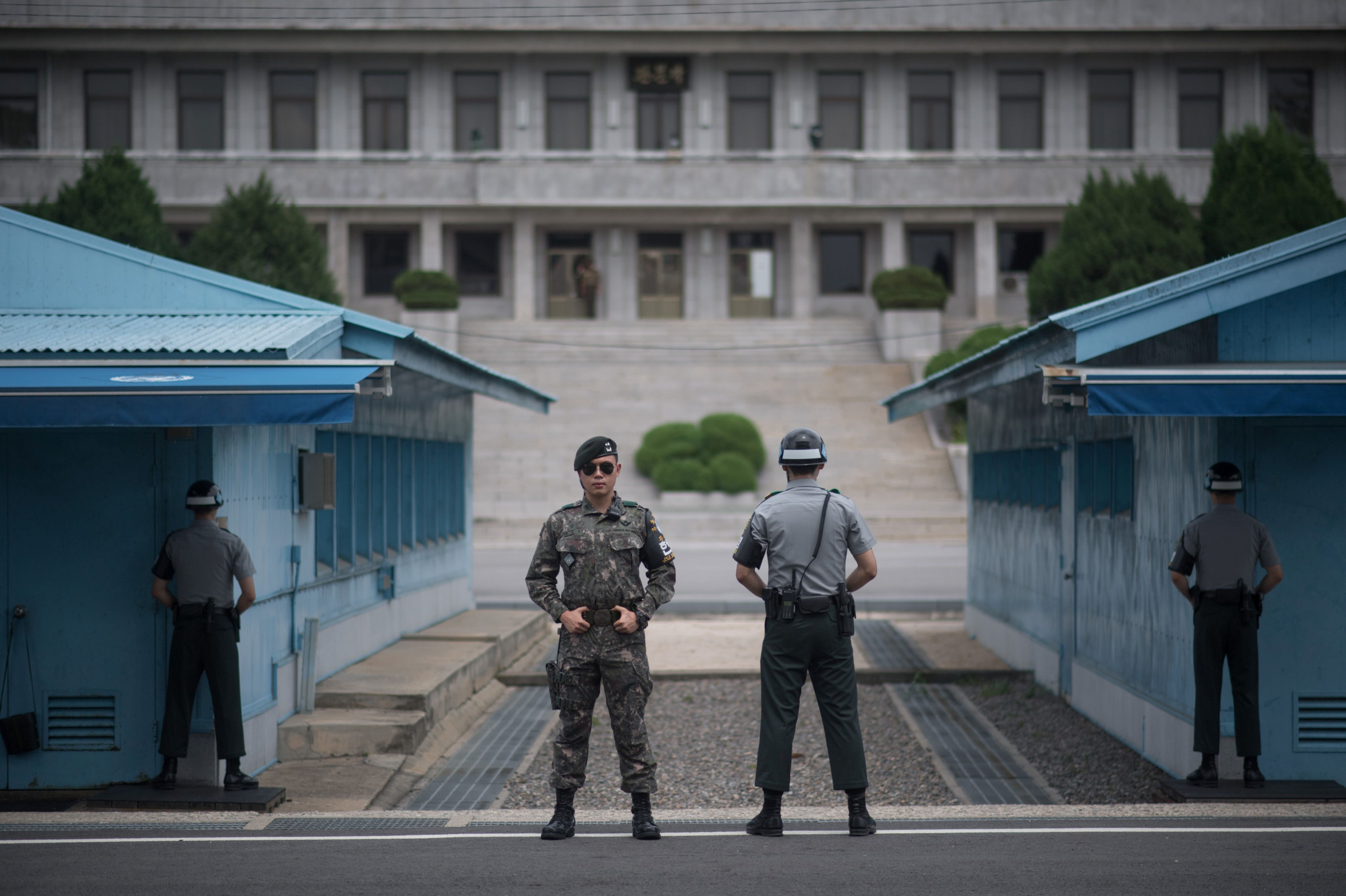 Korean DMZ looking across at NK Blank Meme Template