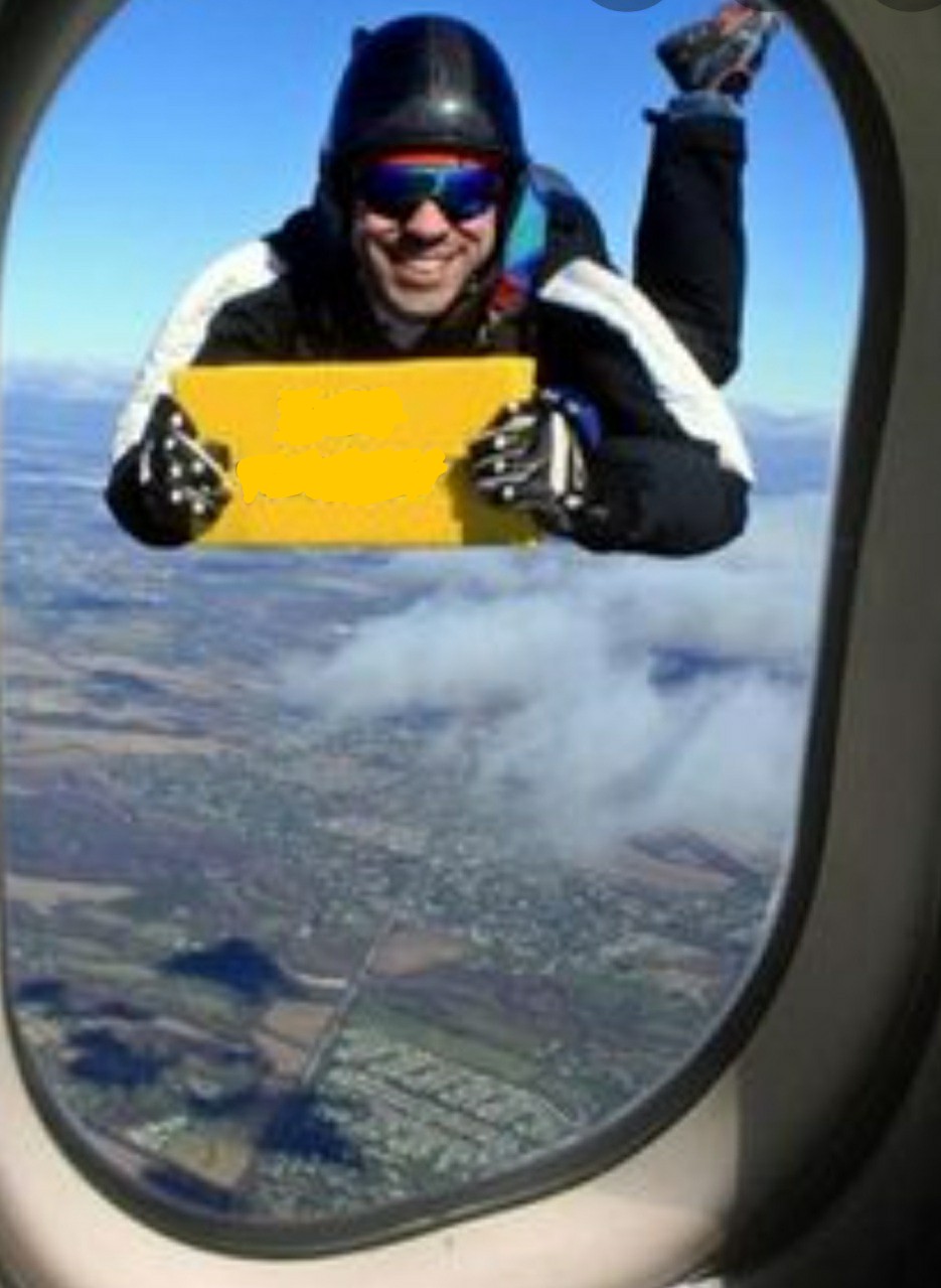 Skydiver with blank sign Blank Meme Template