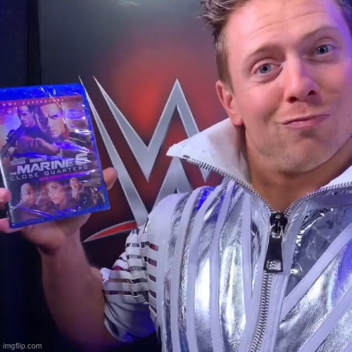 The Miz Holding The Marine 6 | image tagged in the miz holding the marine 6 | made w/ Imgflip meme maker