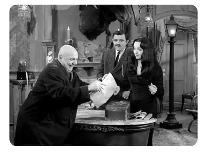 High Quality UNCLE FESTER READS TO GOMEZ ADDAMS AND MORTICIA Blank Meme Template