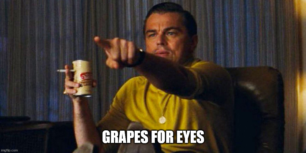 Leo pointing | GRAPES FOR EYES | image tagged in leo pointing | made w/ Imgflip meme maker