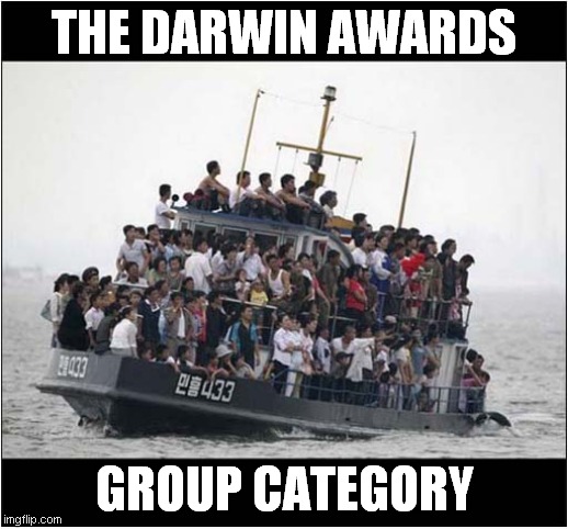 An Overloaded Boat ! | THE DARWIN AWARDS; GROUP CATEGORY | image tagged in darwin award,group,dark humour | made w/ Imgflip meme maker