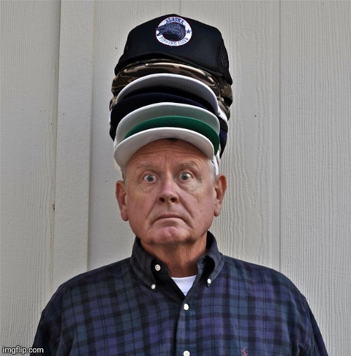 Wearing Lots of hats | image tagged in wearing lots of hays | made w/ Imgflip meme maker