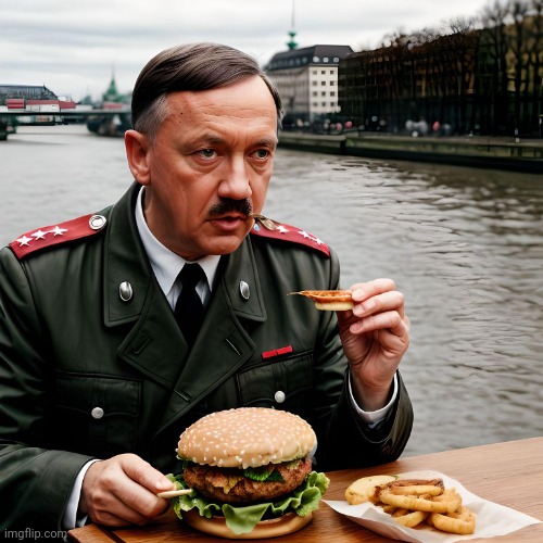 Adolf eating hamburger | image tagged in adolf eating hamburger | made w/ Imgflip meme maker