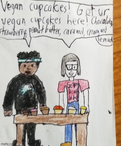 edp445 and thatveganteacher selling vegan cupcakes(her shirt says 
