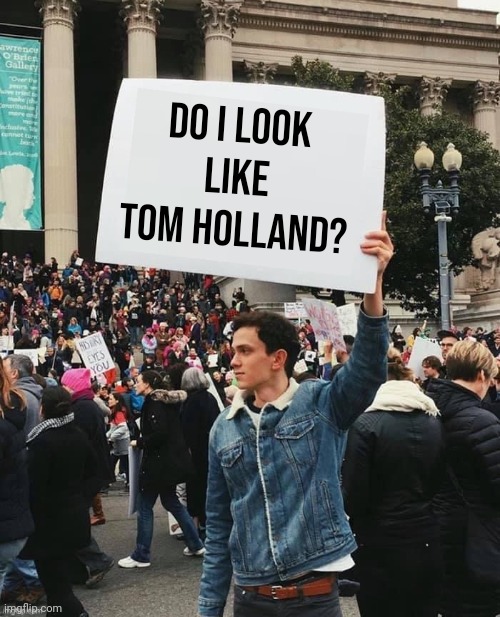 Man holding sign | Do I look like Tom Holland? | image tagged in man holding sign | made w/ Imgflip meme maker