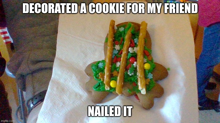 its a jailed octopus | DECORATED A COOKIE FOR MY FRIEND; NAILED IT | image tagged in octopus,christmas,cookies,pretzels | made w/ Imgflip meme maker