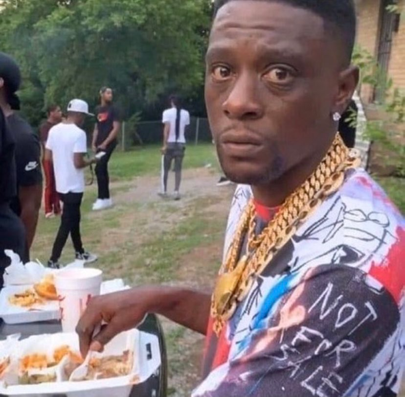 Boosie eating food looking concerned Blank Meme Template