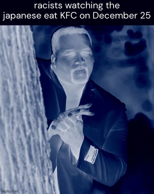 Black guy hiding behind tree | racists watching the japanese eat KFC on December 25 | image tagged in black guy hiding behind tree | made w/ Imgflip meme maker